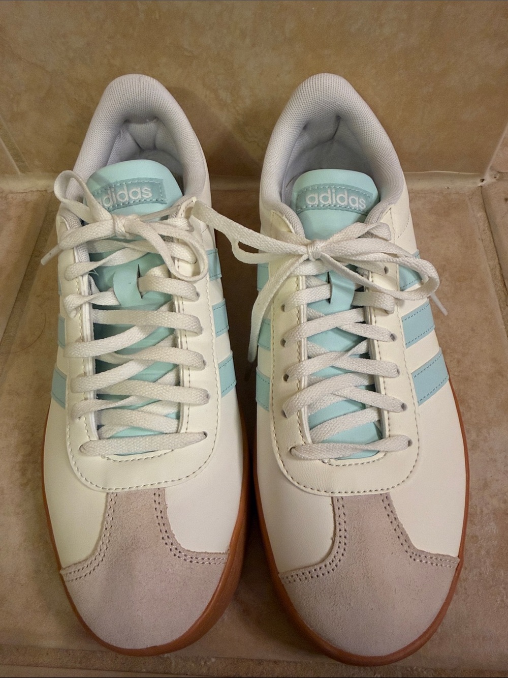 adidas Women’s White Sneakers with Light Blue Stripes and Gum Sole size 9.5